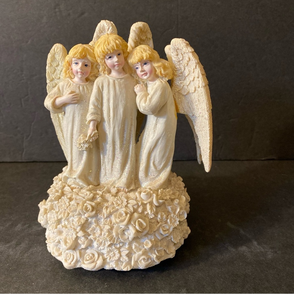 Elegant Cream Angel Figurine music box